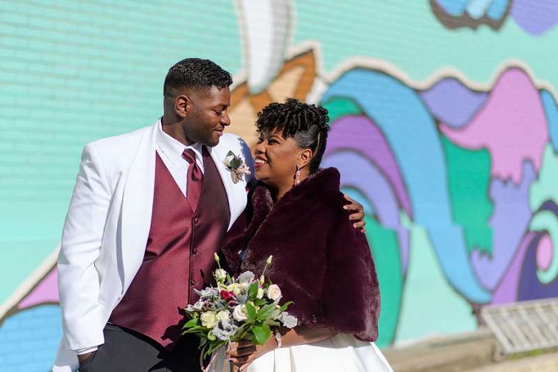 Beautiful black bride and groom for their winter wedding at Historic Post Office in Hampton Virginia