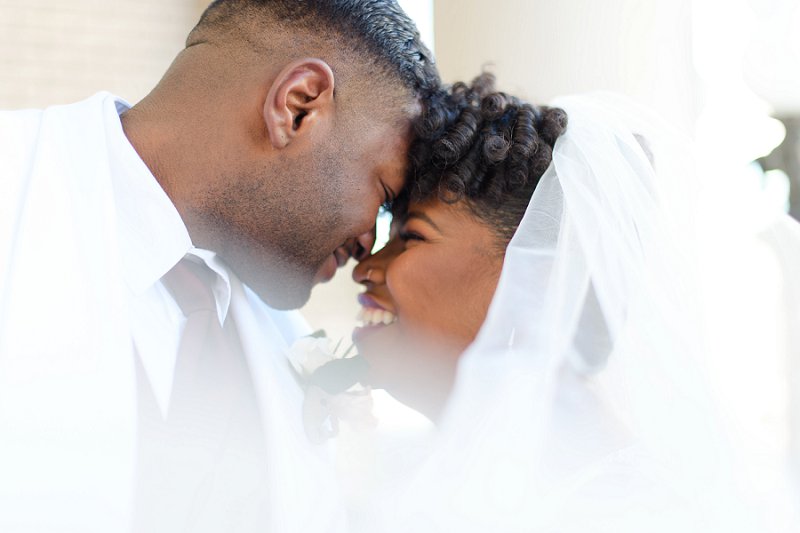 Beautiful black bride and groom for their winter wedding at Historic Post Office in Hampton Virginia