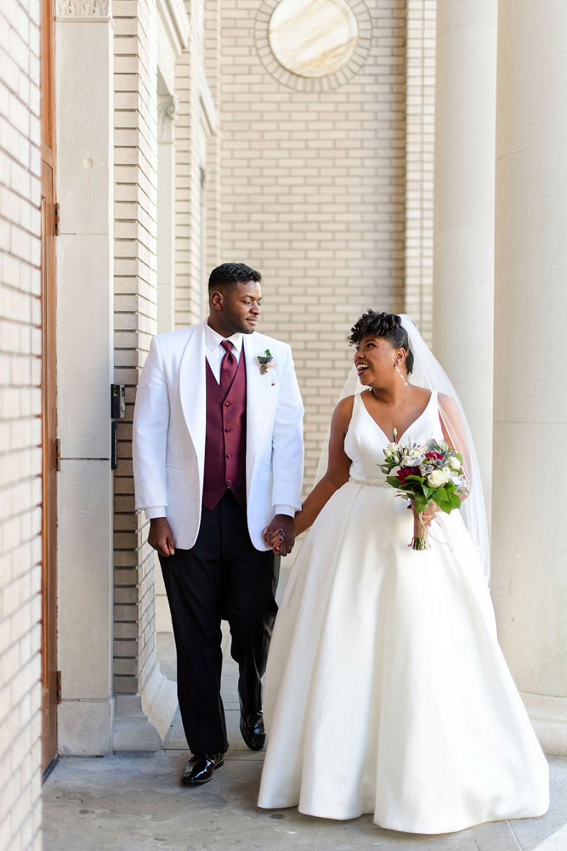 Beautiful black bride and groom for their winter wedding at Historic Post Office in Hampton Virginia