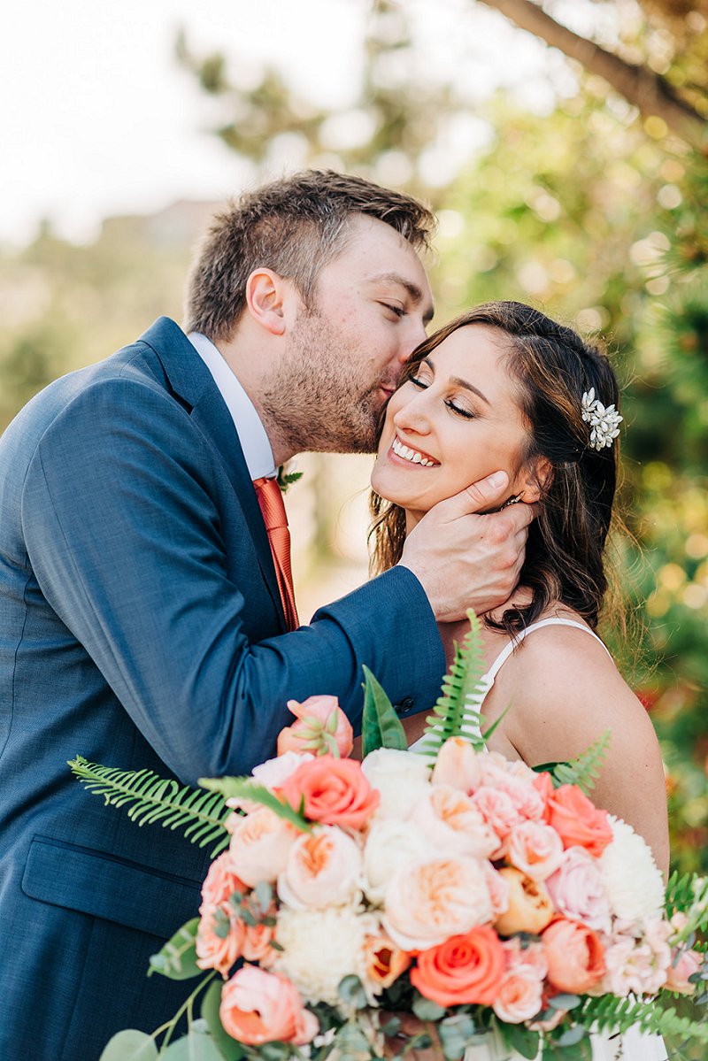 Cheerful beach wedding with orange color palette at First Colony Inn in Outer Banks