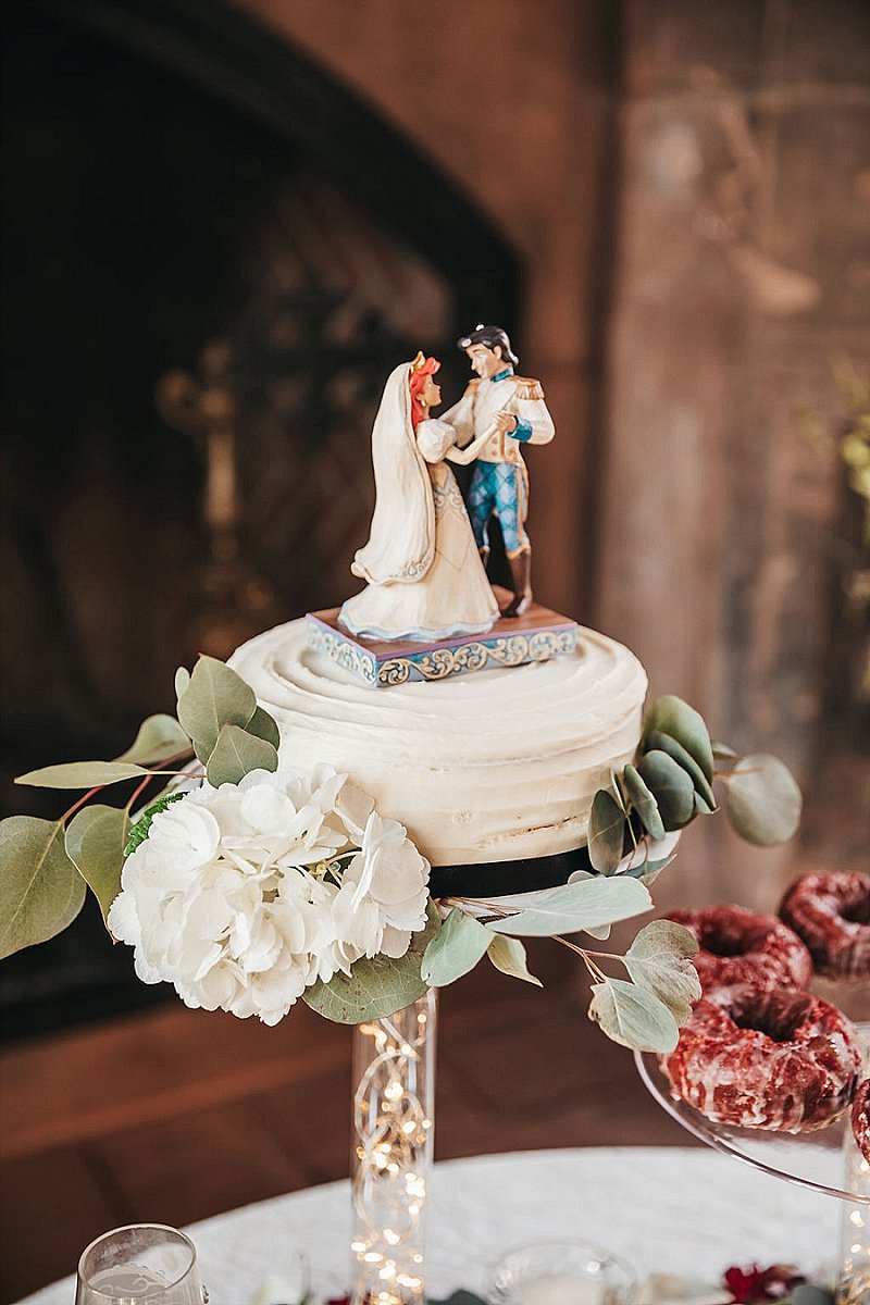 Adorable Disney Little Mermaid with Ariel and Prince Eric wedding cake topper for redhead bride and black haired groom