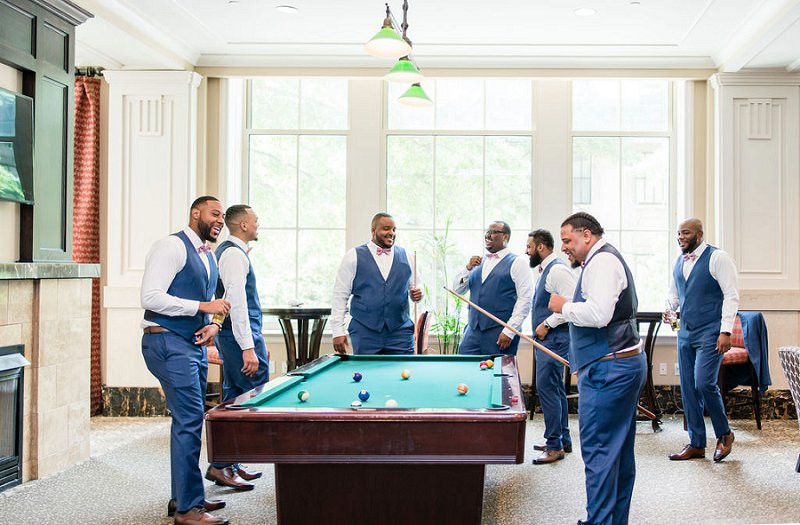 Fun groom and groomsmen portrait idea on the wedding day