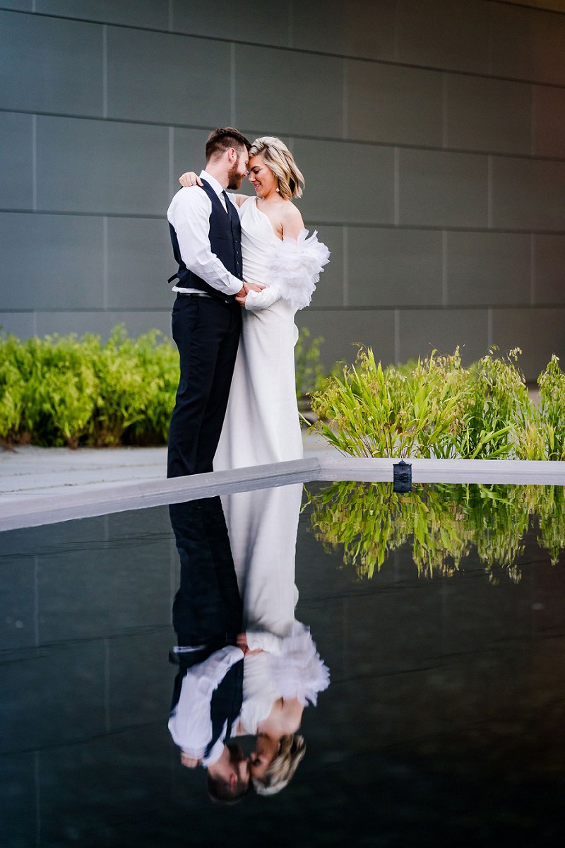 Beautiful bride and groom moment at their modern art museum wedding in Richmond Virginia