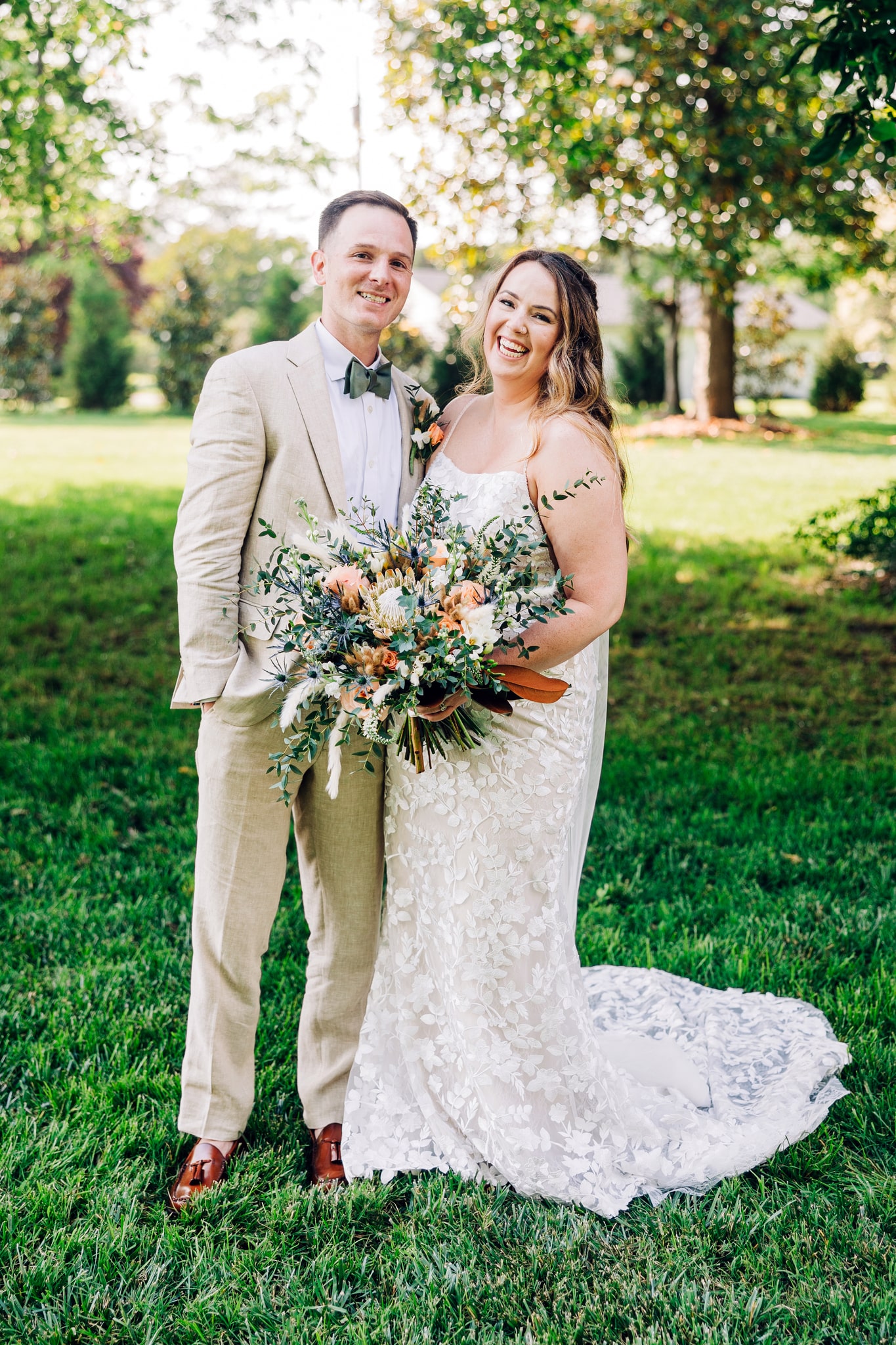 Beautiful rustic boho wedding theme with lace wedding dress and moss green colors