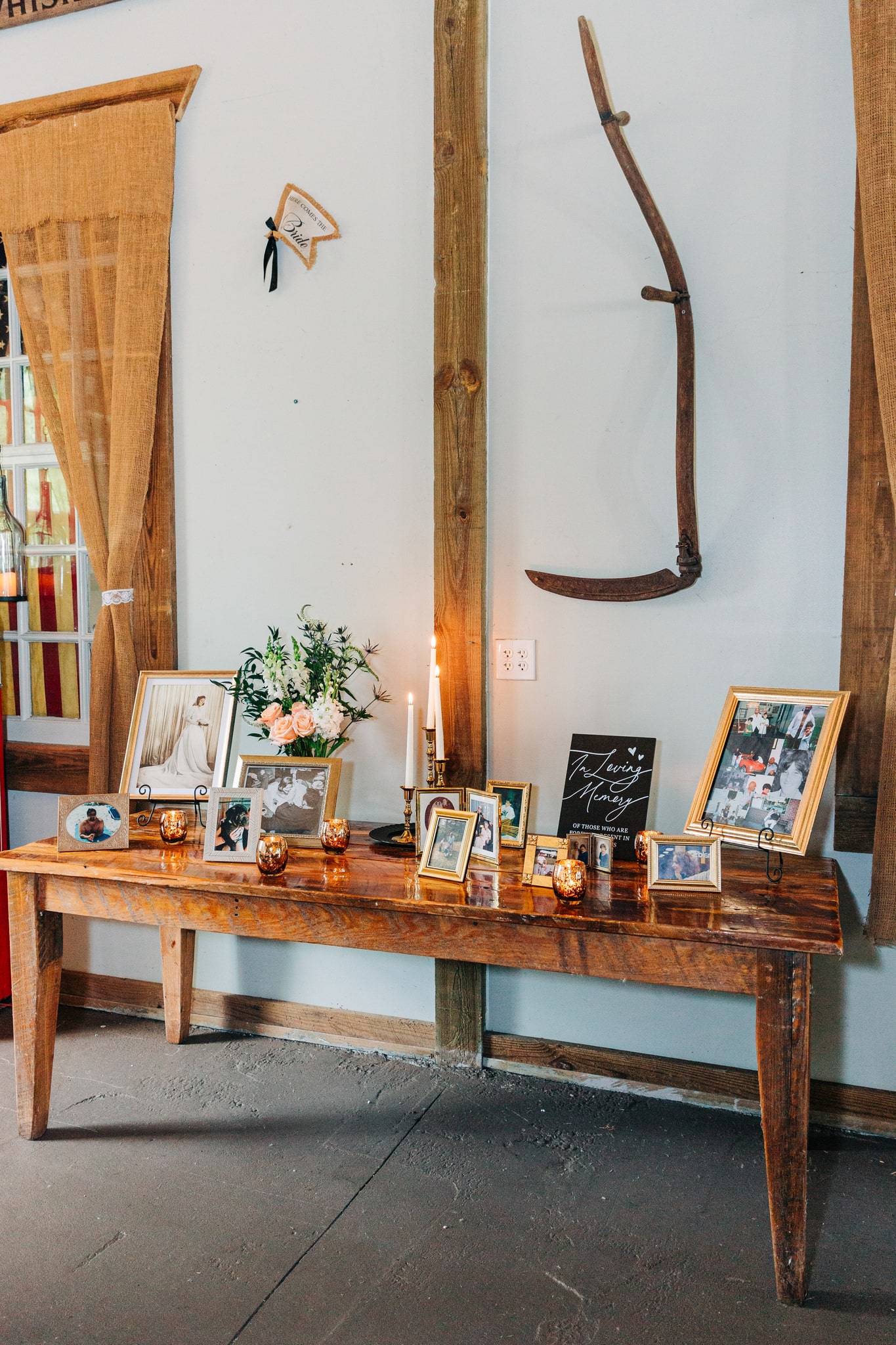 In Loving Memory memorial table for loved ones past at a rustic barn wedding