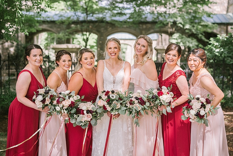 Pink and red bridesmaid dresses for romantic wedding day look in Virginia