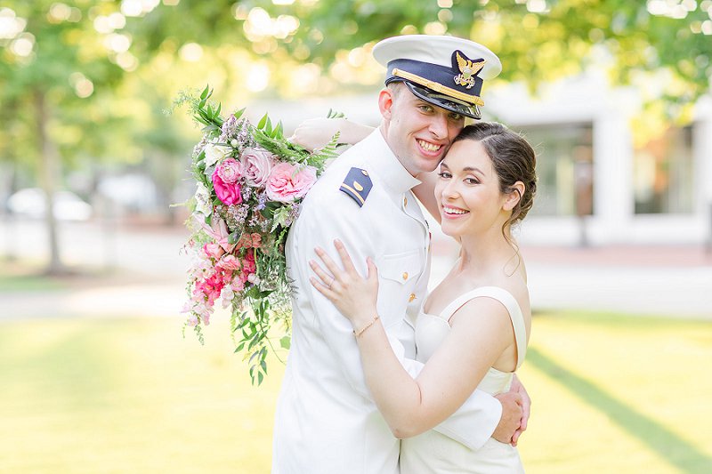 Sweet military groom and bride moment at their William and Mary wedding in Williamsburg Virginia