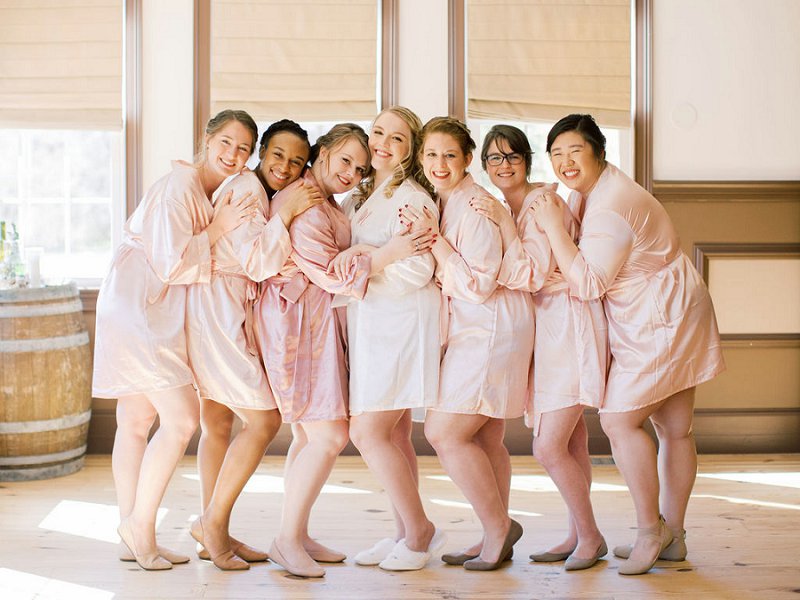 Adorable bridal party photos with pink satin getting ready robes